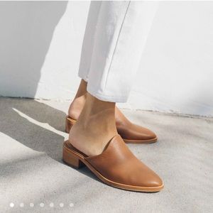 Solid is Venetian Mule in brown leather